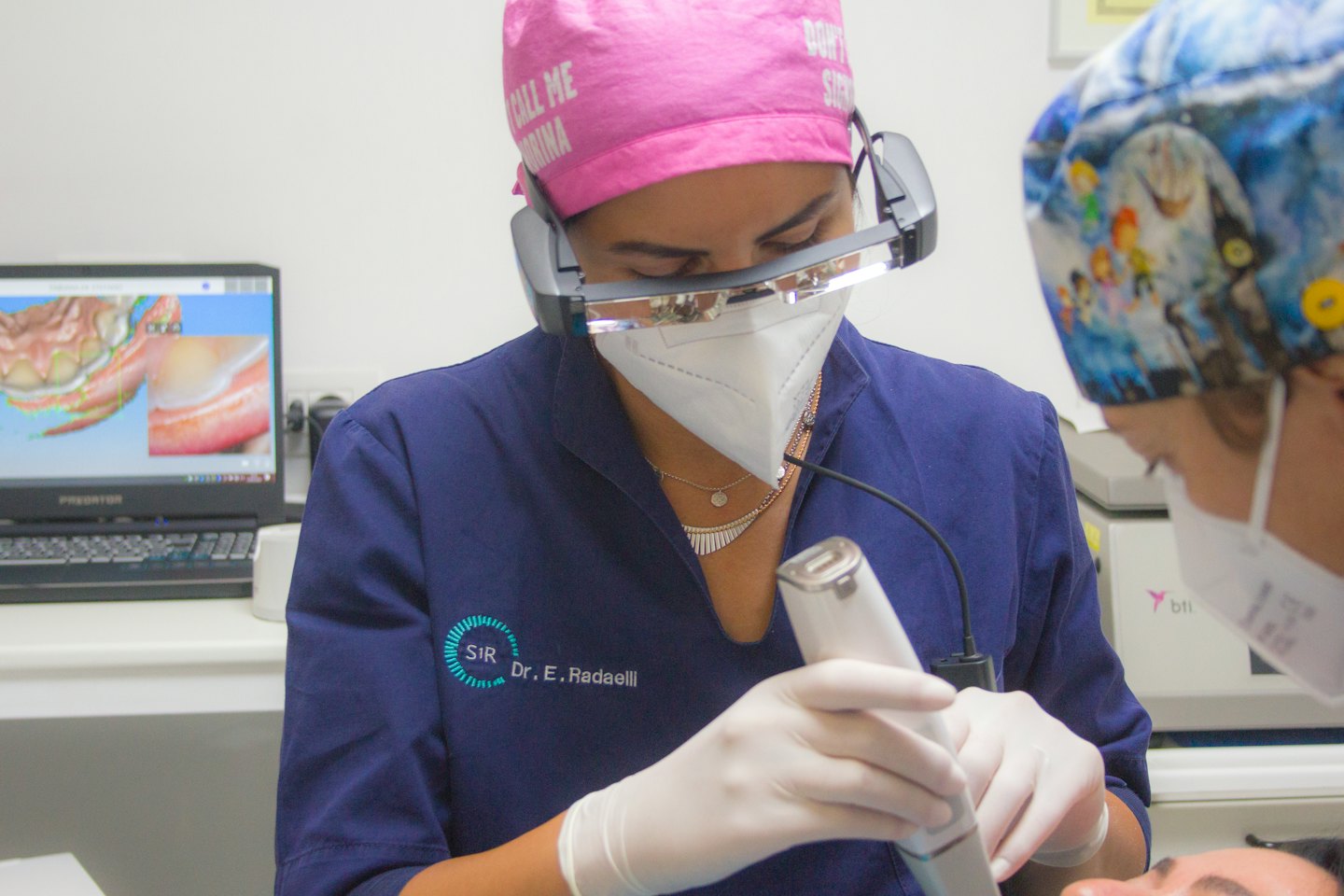Dental professionals use a 3D scanner to create a digital model of teeth.
